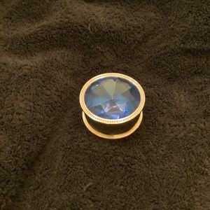 Silver safekeeper trinket box with blue “gemstone” lid.